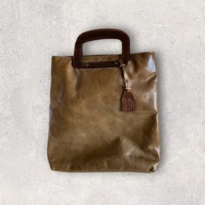 DKNY Vintage 1989 leather handbag with storage bag.